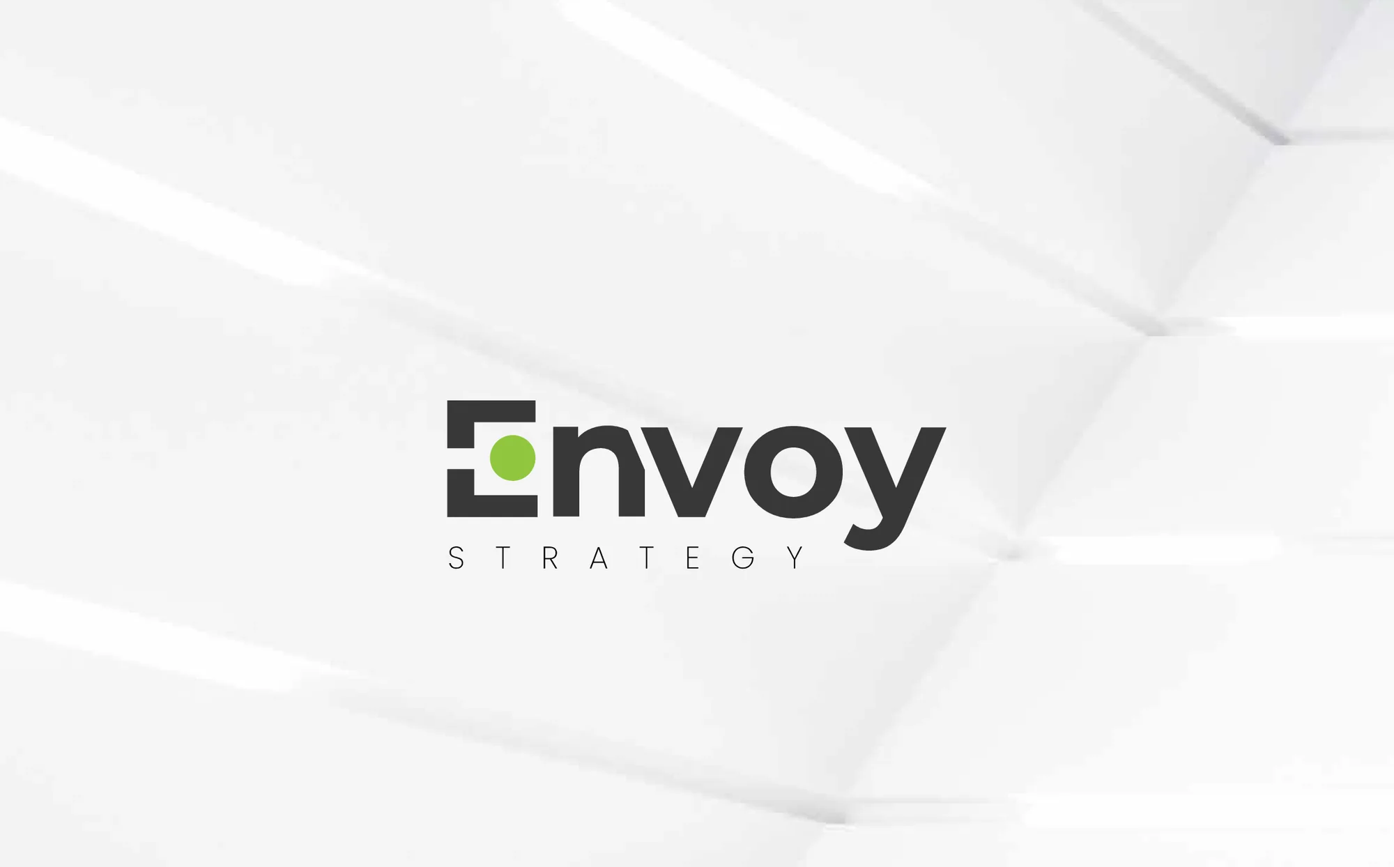 A first-round logo option: “Envoy” in a heavy lowercase with a green dot set into a square E, and STRATEGY spaced out beneath.